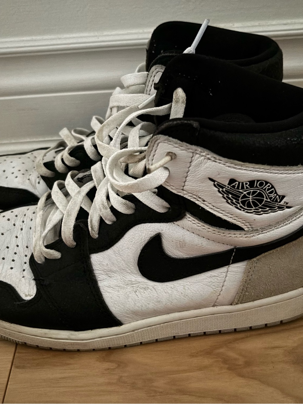 Jordan 1 Mid Men’s Black and White Sneakers